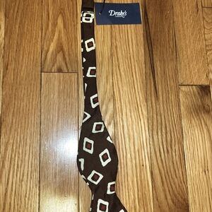 Drakes Brown Geometric Patterned Bow Tie with Cream and Red Orange Deco Accents